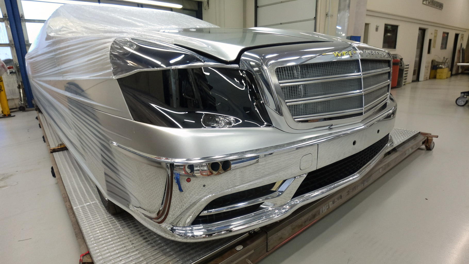 Freshly re-plated chrome car bumper wrapped and prepared for delivery back to the customer