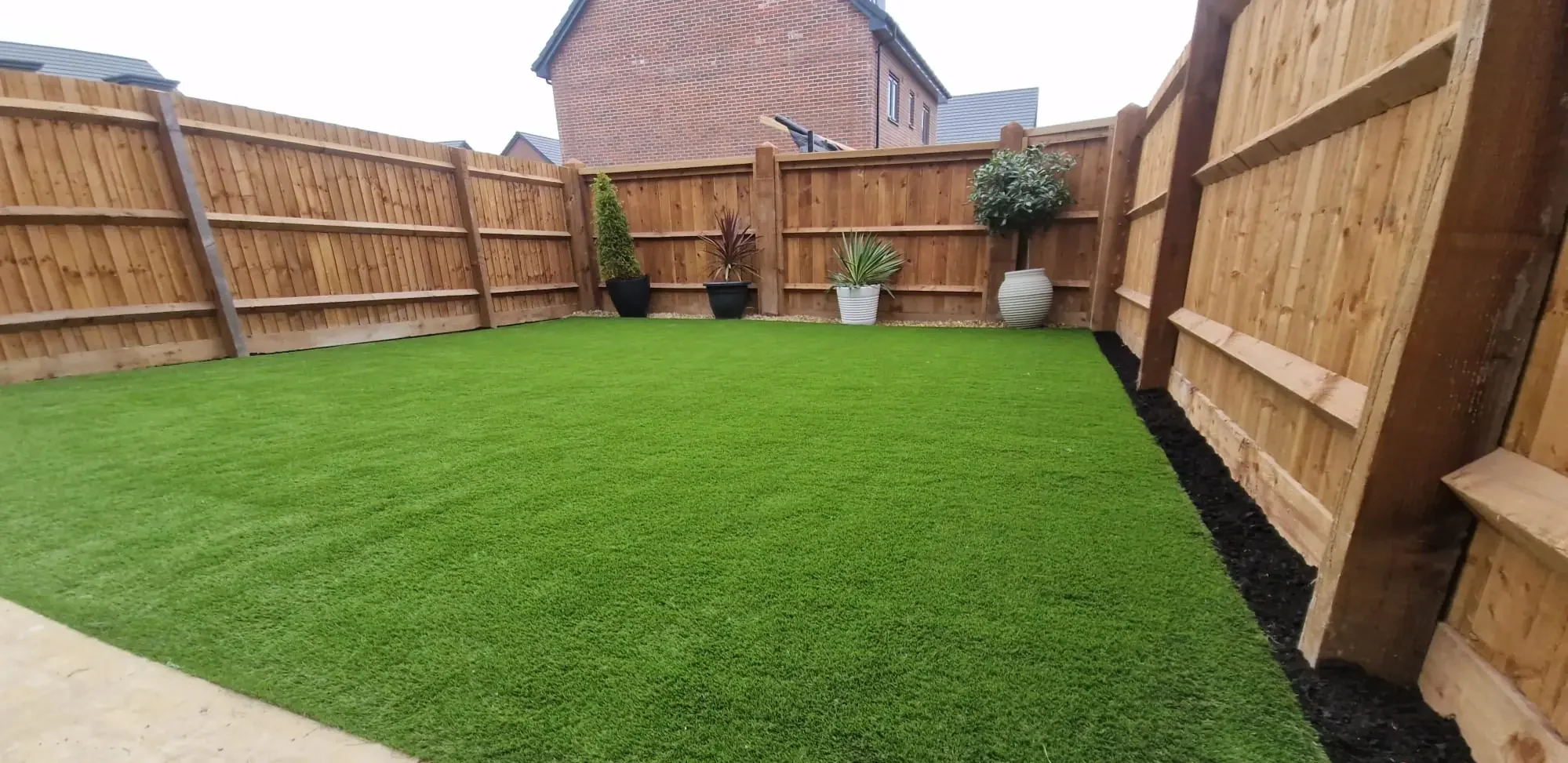 Spacious Family Garden with Premium Artificial Grass